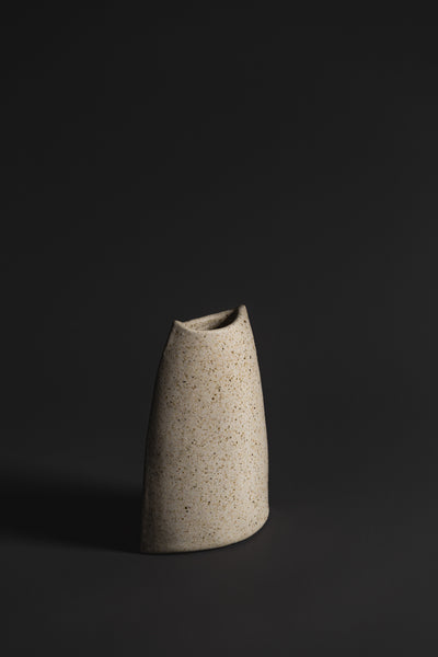 Handmade in natural tones and organic in nature this terrestrial vase is a unique Australian homeware piece to adorn your home.  Type: Ceramic Vase  Materials: Stoneware  Dimensions: 150 x 130mm