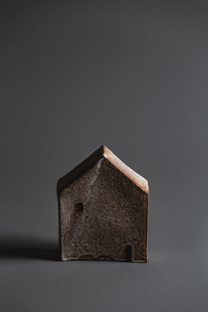 Handcrafted in Melbourne in natural tones and organic in nature this house sculpture is a fine Australian homeware piece to adorn your home or window sill. Each piece is unique. Type: House Sculpture   Material: Ceramic  Dimensions: 150 x 125mm 