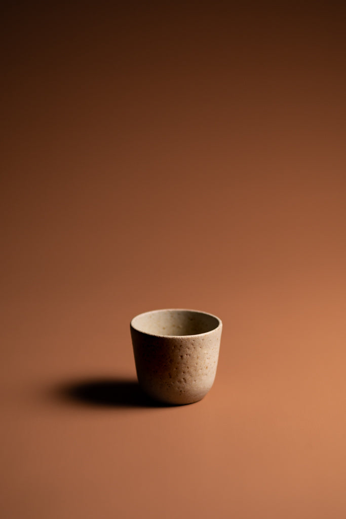 Handmade organic cup. A natural, handcrafted homeware piece made Kristin in Melbourne. Balancing artistic expression with functionality.  Type: Small Cup  Material: Stoneware  Dimensions: 80 x 70mm     130mls