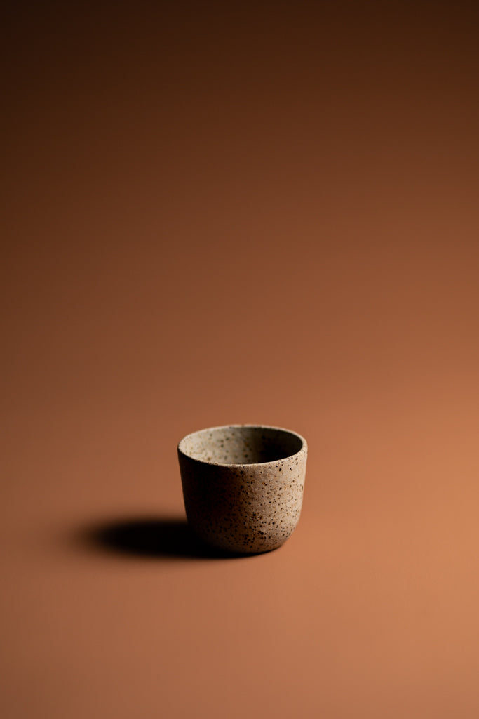 Handmade organic cup. A natural, handcrafted homeware piece made Kristin in Melbourne. Balancing artistic expression with functionality.   Type: Small Cup  Material: Stoneware  Dimensions: 80 x 60mm   150mls