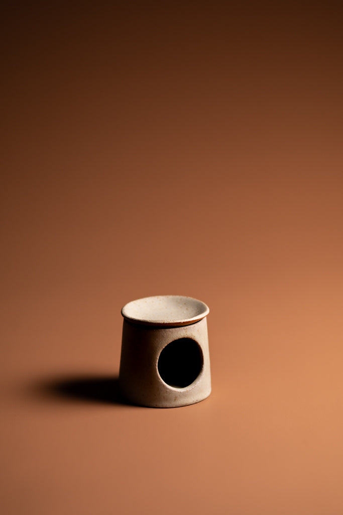 Handmade oil burner. A natural, handcrafted homeware piece made Kristin in Melbourne. Balancing artistic expression with functionality. Type: Oil Burner  Colour: Natural  Material: Ceramic