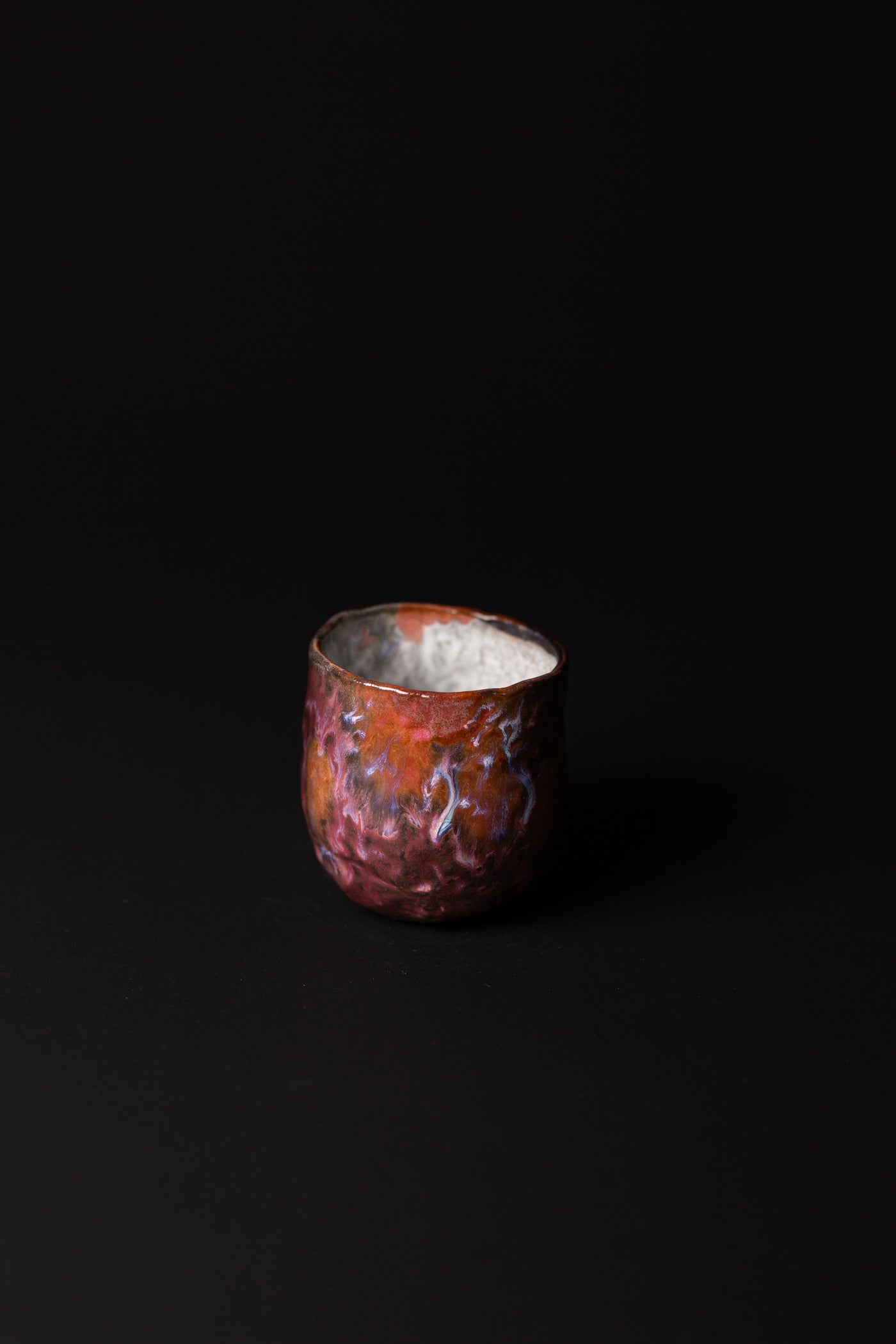 Handcrafted in Melbourne, Bec's connection with clay form has an Asobimasu playfulness. Using recycled clay and glazing, this organic mug embodies the acceptance of oddity and imperfection.  Type: Mug  Material: Stoneware  Dimensions: 70 x 75mm     170mls