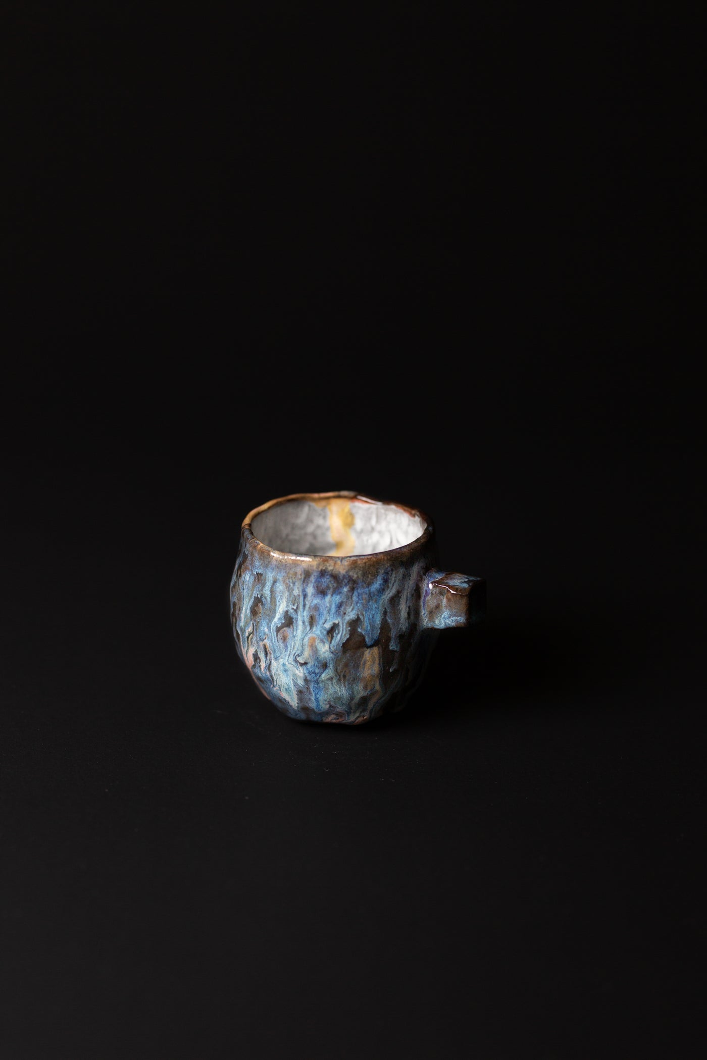 Rebecca’s objects possess a whimsy. With unabashed spontaneity in each piece, nothing is left behind. This mug is a natural, beautiful piece of Australian homeware. Type: Mug  Material: Stoneware  Dimensions: 75 x 75mm     180mls