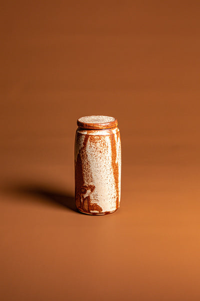 Handmade with traditional wheel-thrown techniques and fired at high temperatures for durability. This handcrafted, jar is a natural, beautiful piece of Australian homeware. Type: Jar with Lid  Colour: White  Materials: Stoneware Dimensions: 180 x 80mm