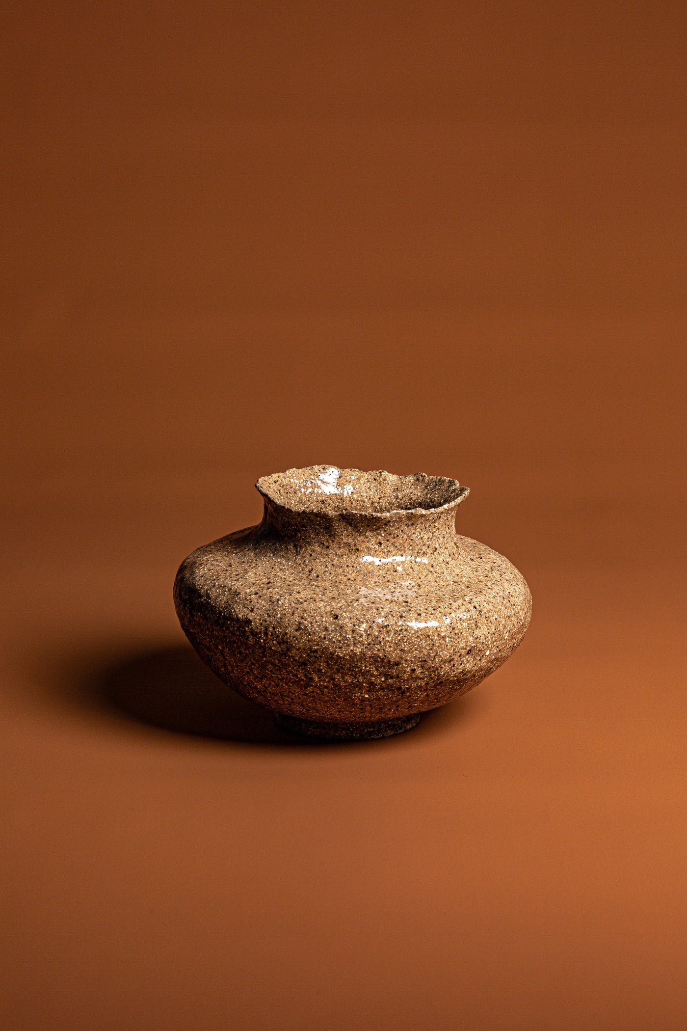 Uninhibited designs, with purity of process and experimentation we see the artist mark in this handcrafted grot textured Ikebana vase.  A beautiful piece of Australian homeware. Type: Ikebana Vase  Material: Stoneware  Dimensions: 260 x 100mm 
